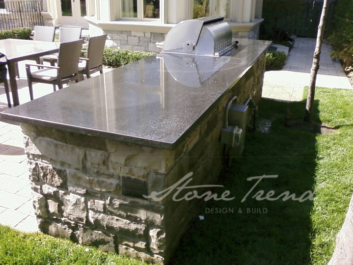 Outdoor kitchen granite counter top barbeque